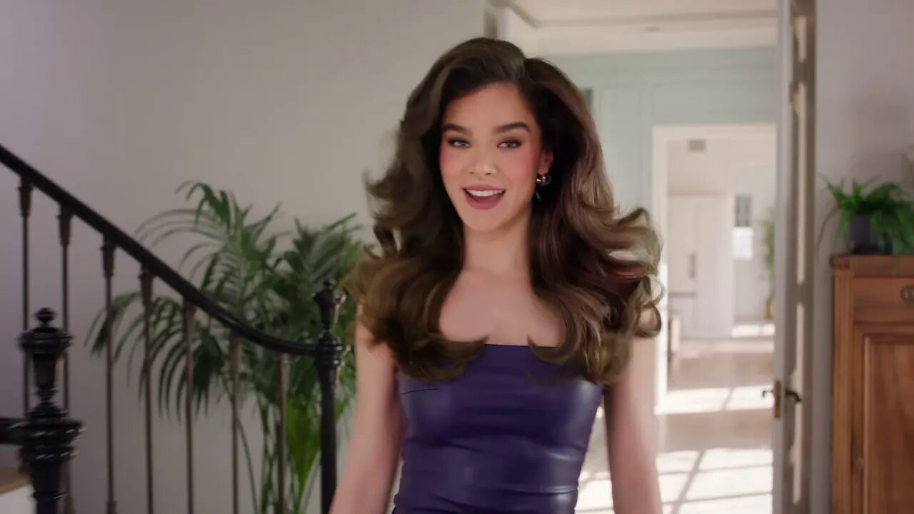 Smiling woman in a purple dress