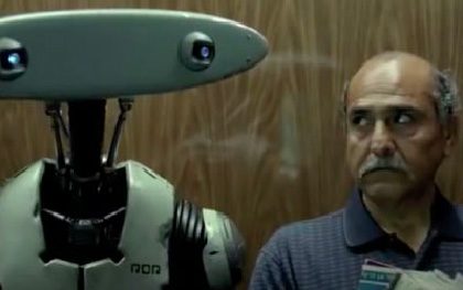 Humanoid robot beside a confused man