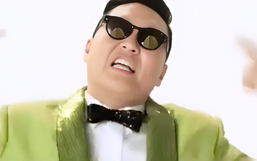 Man wearing black bow tie and shades