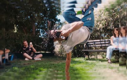 Outdoor breakdancing with an audience